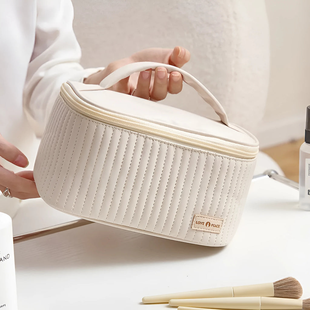 Open-top women's makeup bag in PU leather, shown in a light blue solid colour.