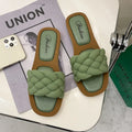 Women's plaid pattern beach sandals with thick PVC sole in white, green, black, or orange.