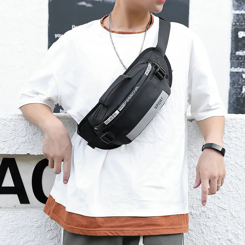Reflective men's crossbody waist bag in black, small horizontal square shape with zipper closure and nylon waterproof finish