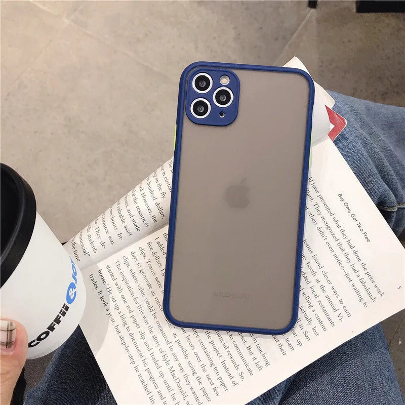 Transparent solid colour silicone shockproof protective case for iPhone on a dark background.