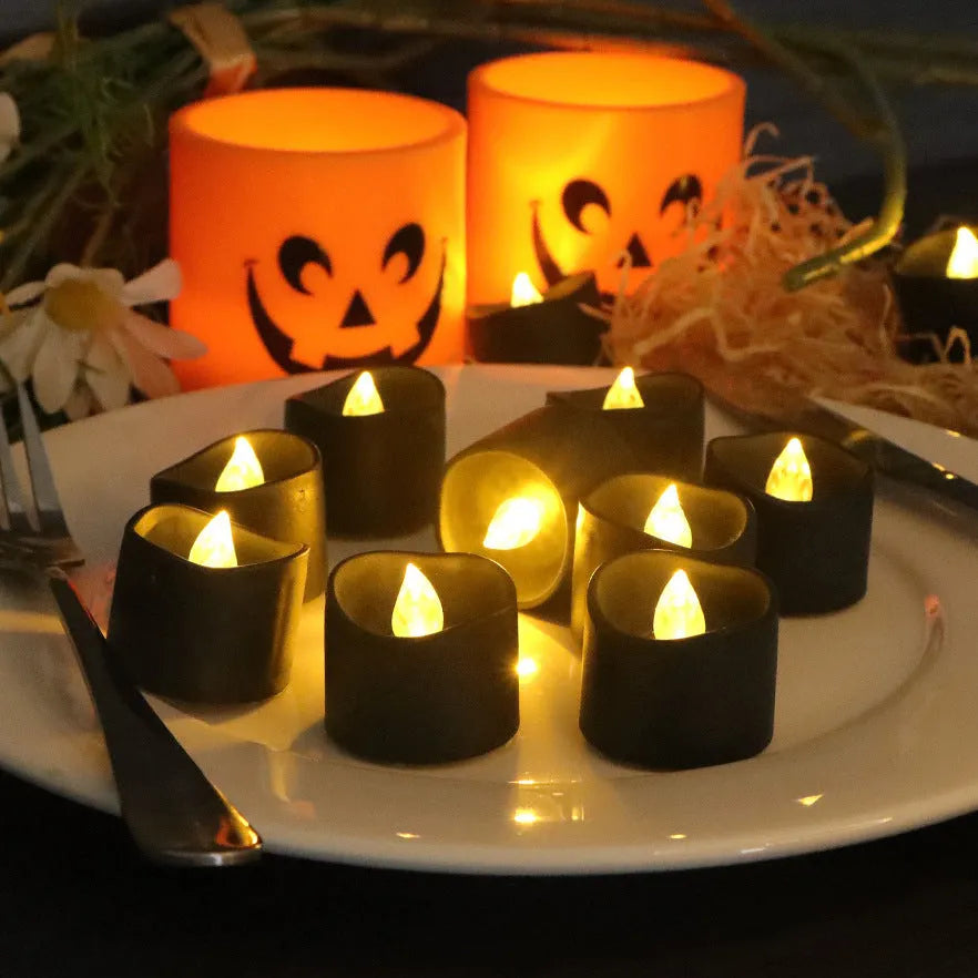 12 pack LED Christmas candles with black shell design and yellow flash style