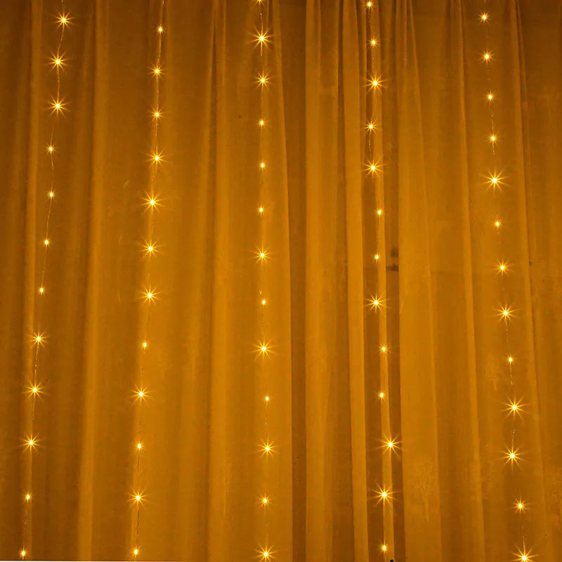 Copper wire curtain string lights with multiple LED bulbs, shown in a choice of blue, purple, or white colours.