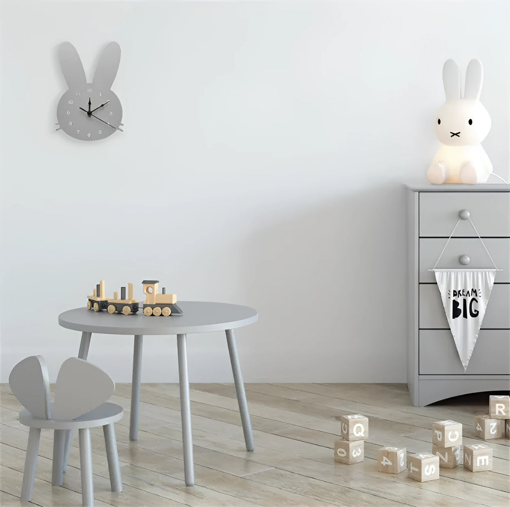 Wooden cartoon alien-shaped wall clock in a chosen design and colour, such as a pink crown or grey rabbit motif.