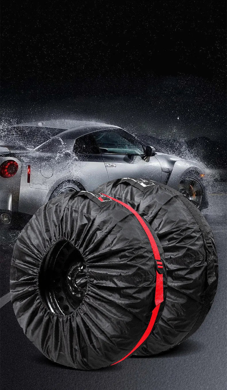 Set of four black Oxford cloth car tyre protective covers laid flat, showing their circular shape and durable fabric texture.