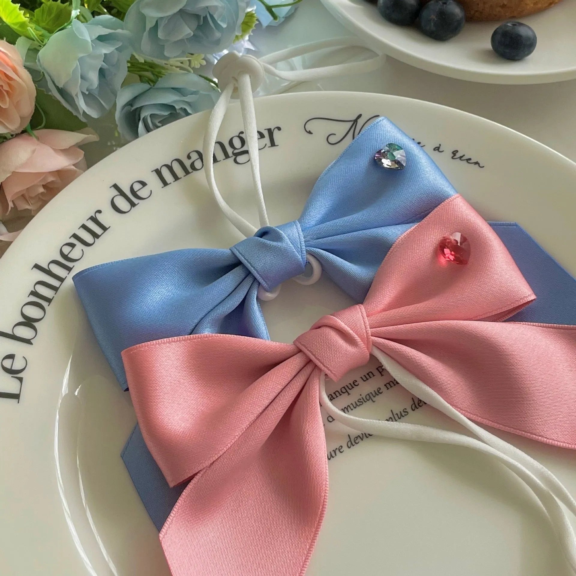 Princess style dog hair band headdress with a large, adjustable bow on a double-sided jacquard ribbon.