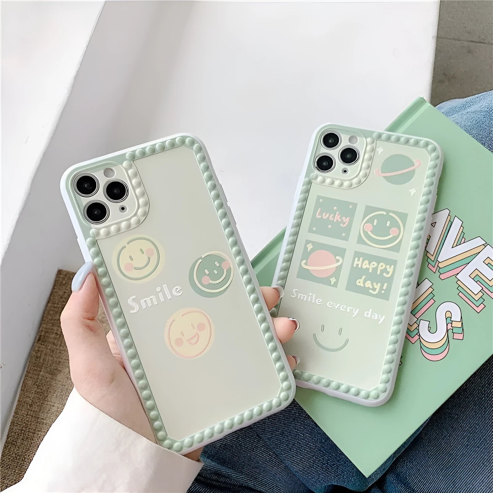 Green TPU iPhone case with geometric smiley face and polka dot frame design