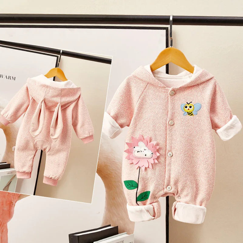 Pink little bee print baby jumpsuit with long sleeves, single-breasted front, on white background