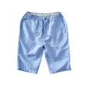 Men's light grey linen capris with straight-leg loose fit on hanger