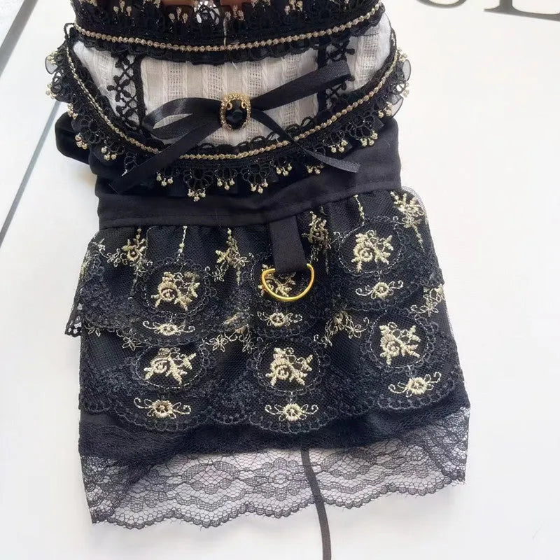 Golden gothic-style flared skirt for a small dog or cat on a white background.