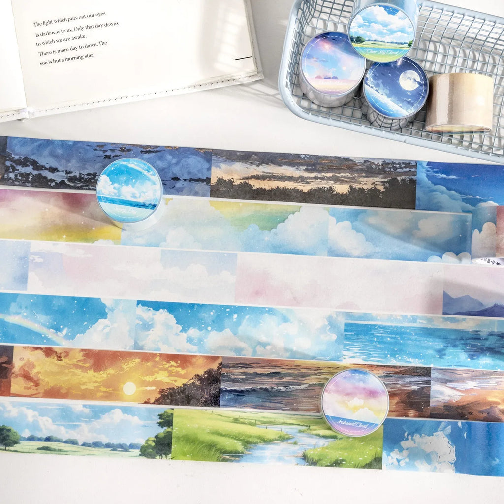 Japanese paper decorative tape roll with sky-themed designs including colourful clouds and purple nebulae