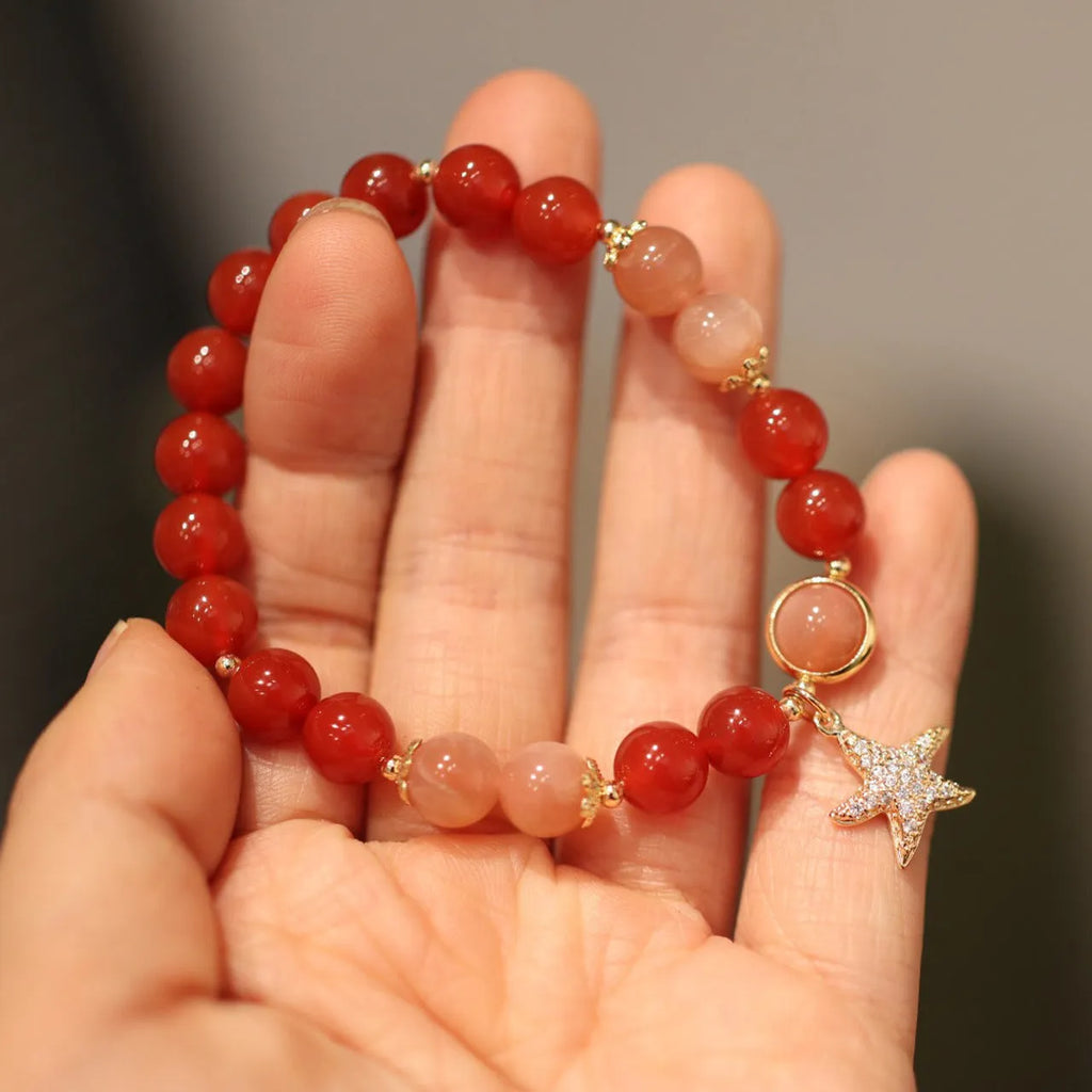 Handmade red agate and Sands Orange Sunstone ethnic bracelet for women with 8mm beads and star design.