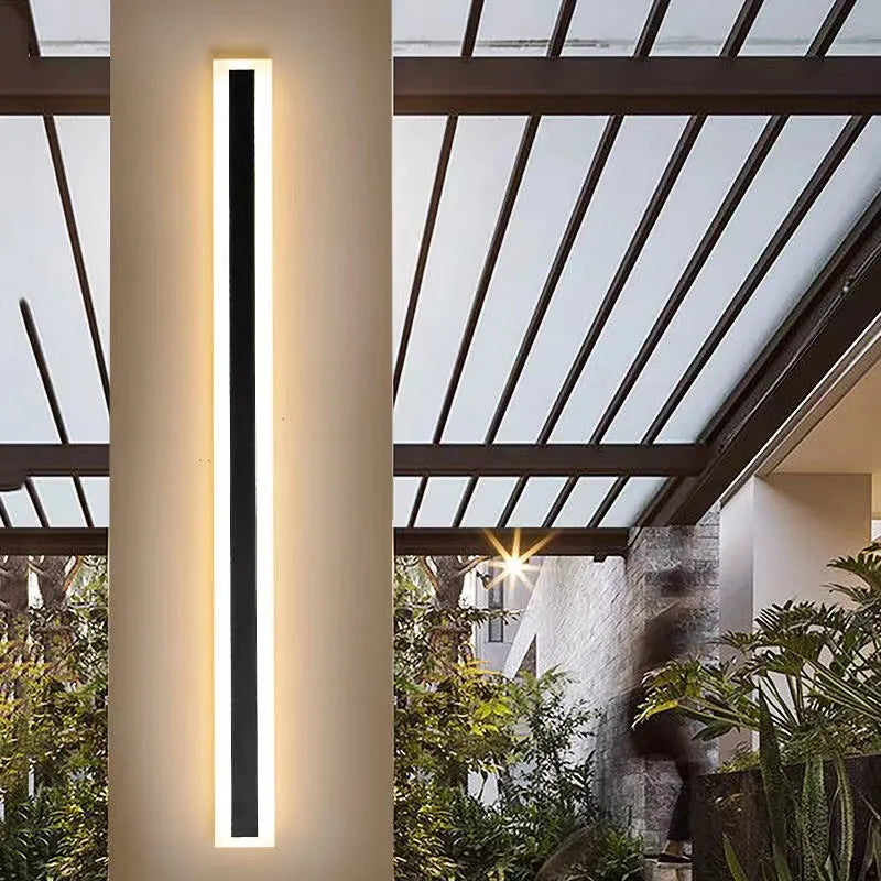 IP65 waterproof outdoor LED wall lamp in silver Alec finish, showing adjustable warm white and cool white light colours.