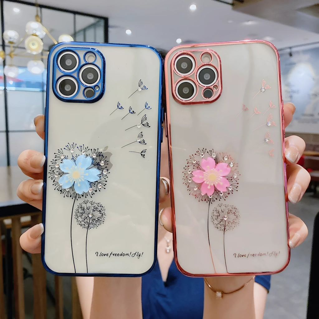 Green iPhone case with 3D white floral design and a silver rotating kickstand extended from the back.