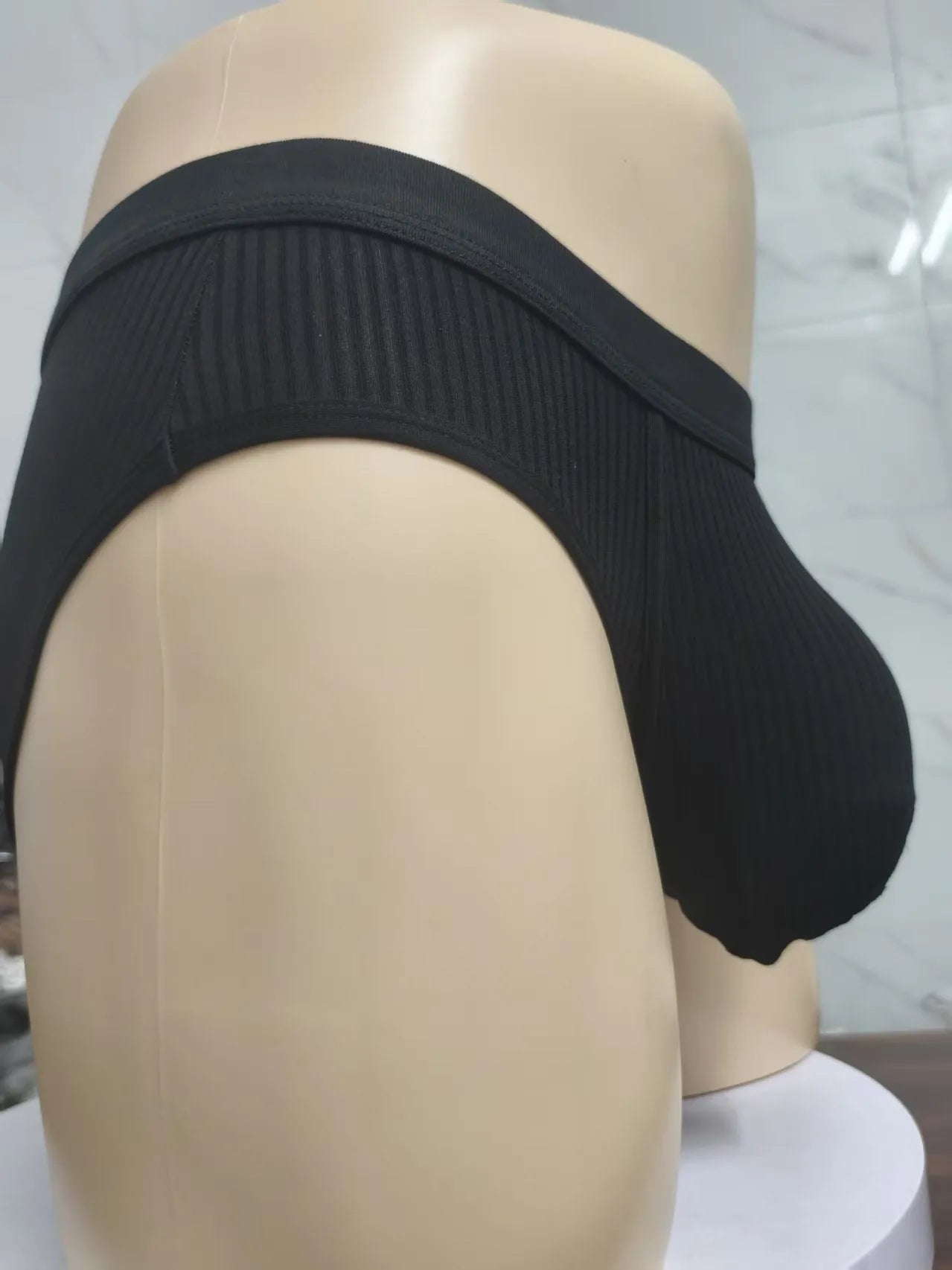 Men's solid colour U-shaped breathable underwear in viscose fabric on a white background