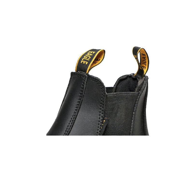Black leather high-top safety work boots with anti-piercing sole on a work site background.