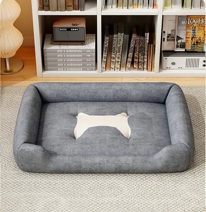 Rectangular plush pet sofa mat in grey shown with size chart showing six dimensions from 45x30cm to 90x70cm
