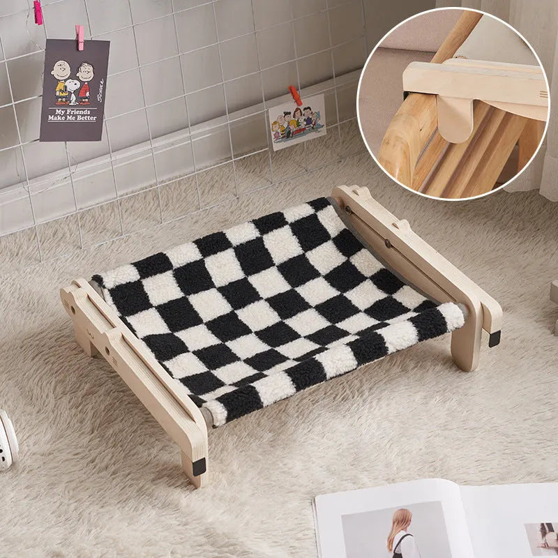 Solid wood pet bed for cats with a removable plaid cover