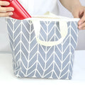 Arrow pattern polyester cosmetic bag with zip closure for moisture-resistant storage.