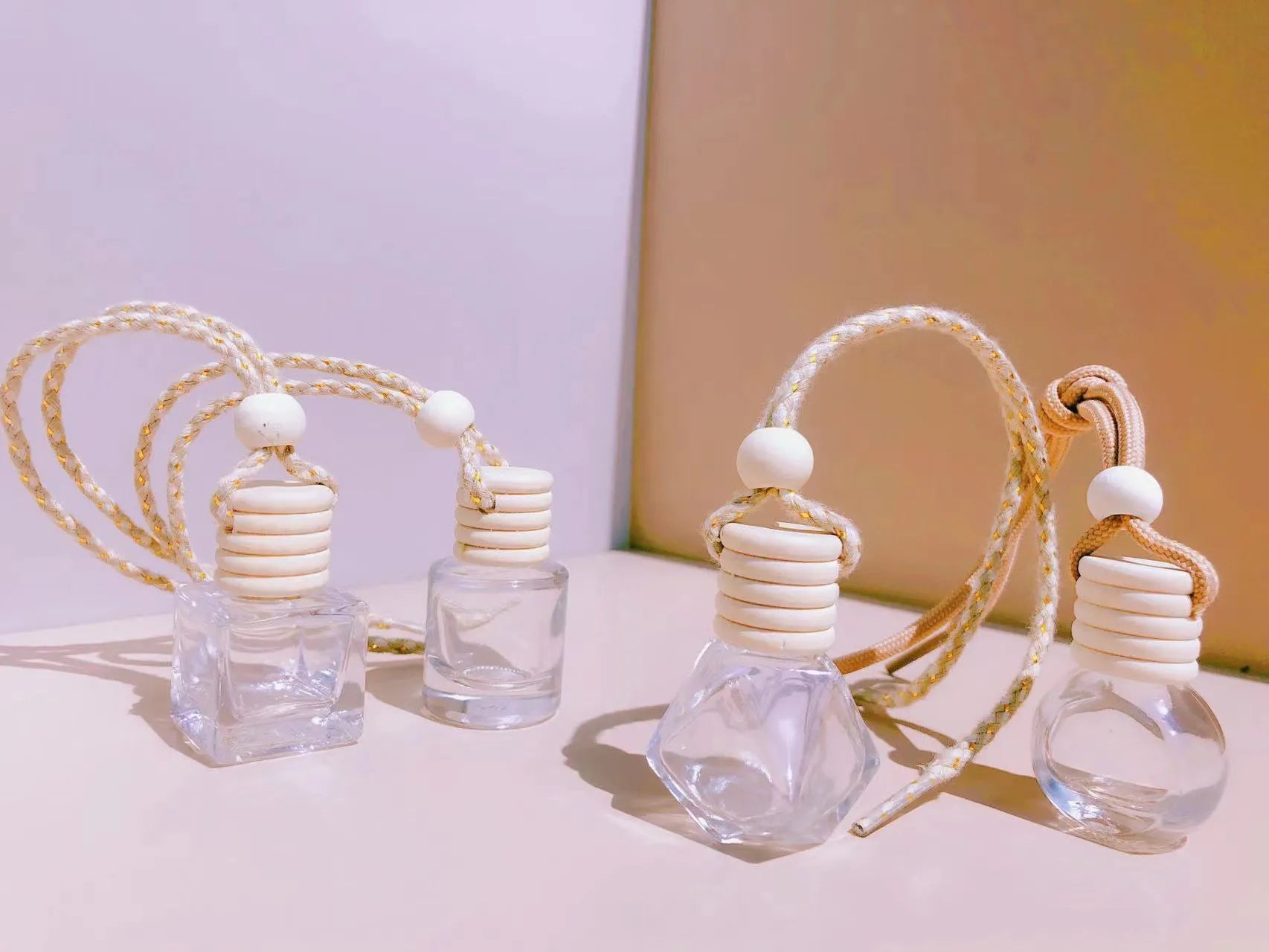 Glass car perfume pendant fragrance bottle in cylinder, diamond, flat drum, and square shapes