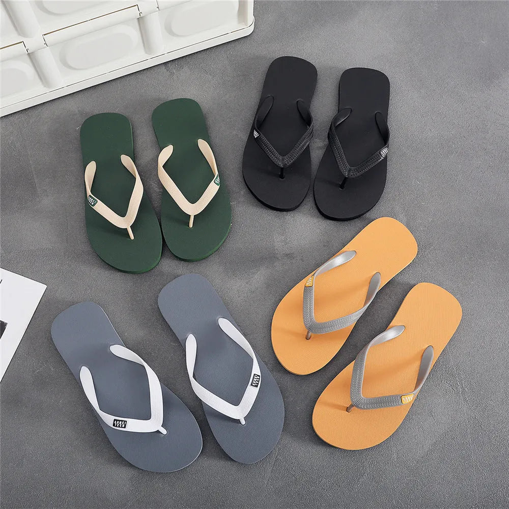 Men's black rubber flip-flop with vulcanised sole and EVA upper, shown from the side.