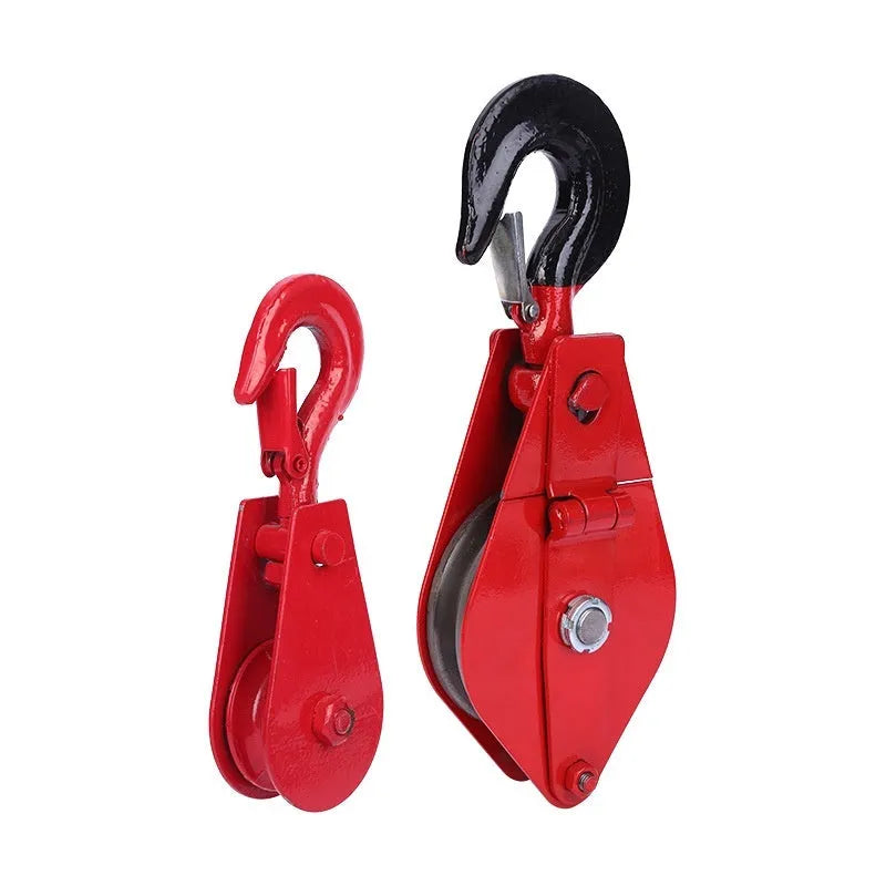 Red or galvanised industrial steel lifting pulley with a forged hook and safety latch.