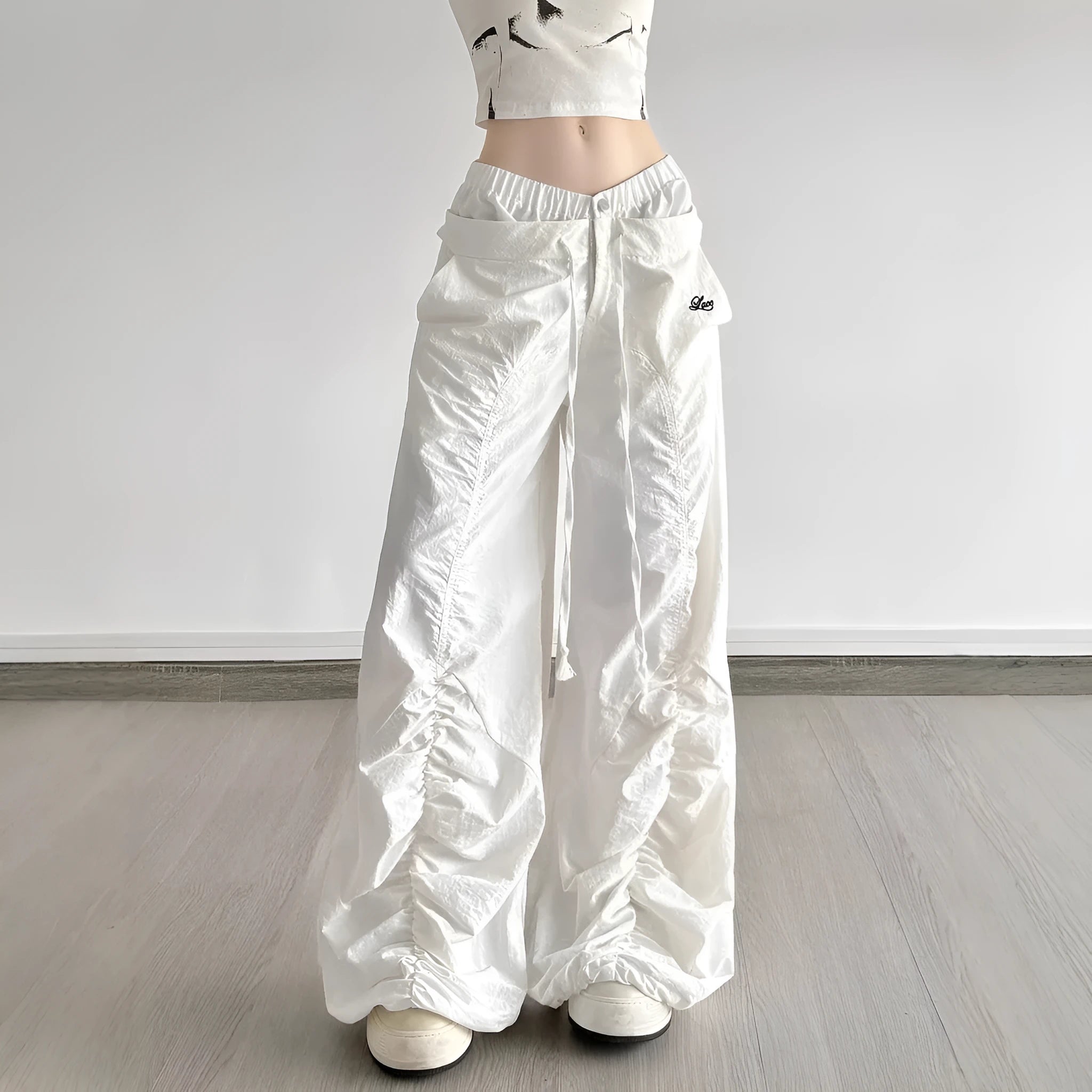 White ruffle drawstring lace letters embroidered slacks with high waist and multiple pockets