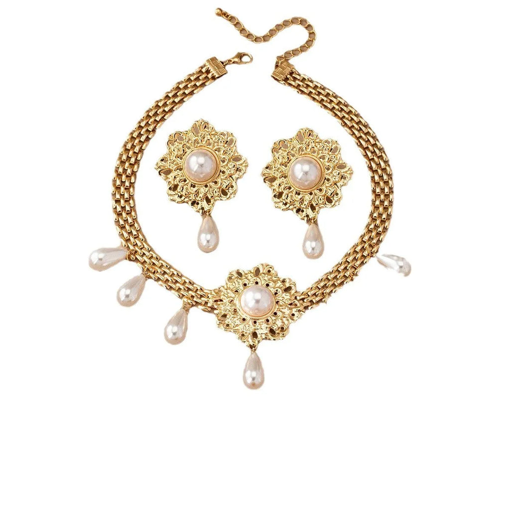 French retro hollow flower pearl tassel jewellery set in white, including necklace, earrings, and ring, alloy material