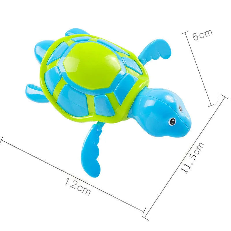 Plastic baby tortoise bath toy floating in water for infant bath time play