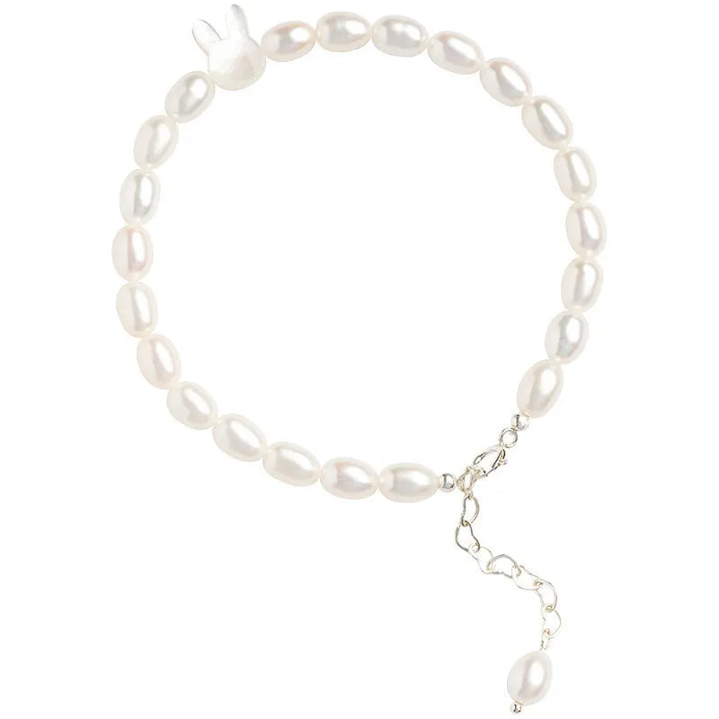 White shell pearl and 925 silver rabbit charm bracelet with elastic string
