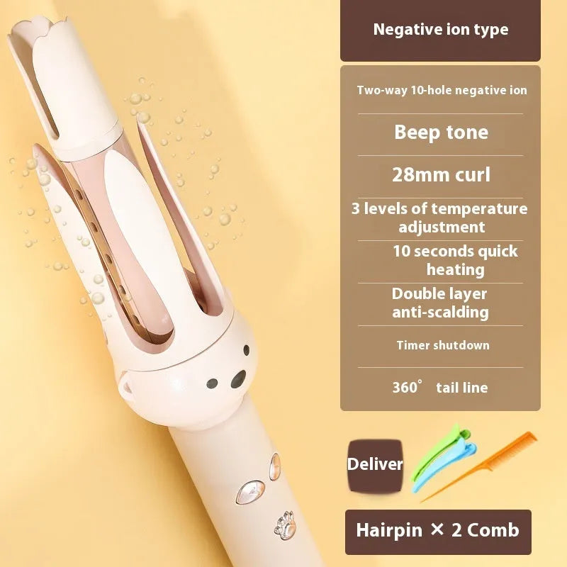 Beige anion automatic hair curler with hair stick on a white background.