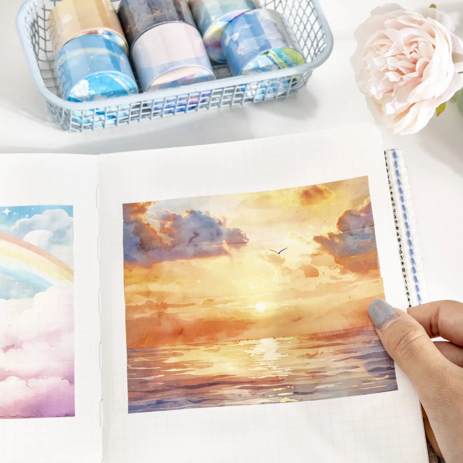 Japanese paper decorative tape roll with sky-themed designs including colourful clouds and purple nebulae