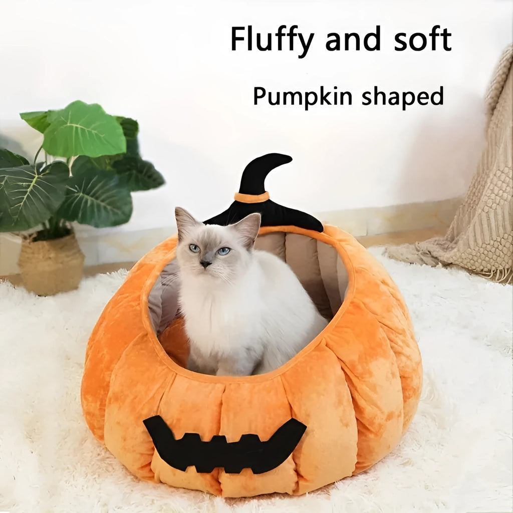 Halloween-themed orange pumpkin-shaped soft plush bed for a cat or small dog, featuring a cartoon devil design.