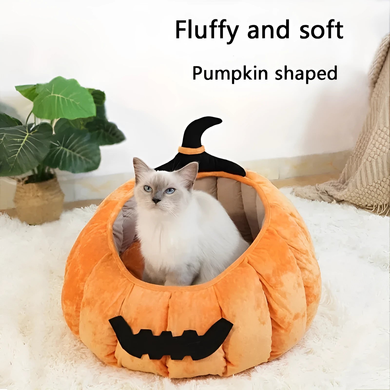 Halloween-themed orange pumpkin-shaped soft plush bed for a cat or small dog, featuring a cartoon devil design.