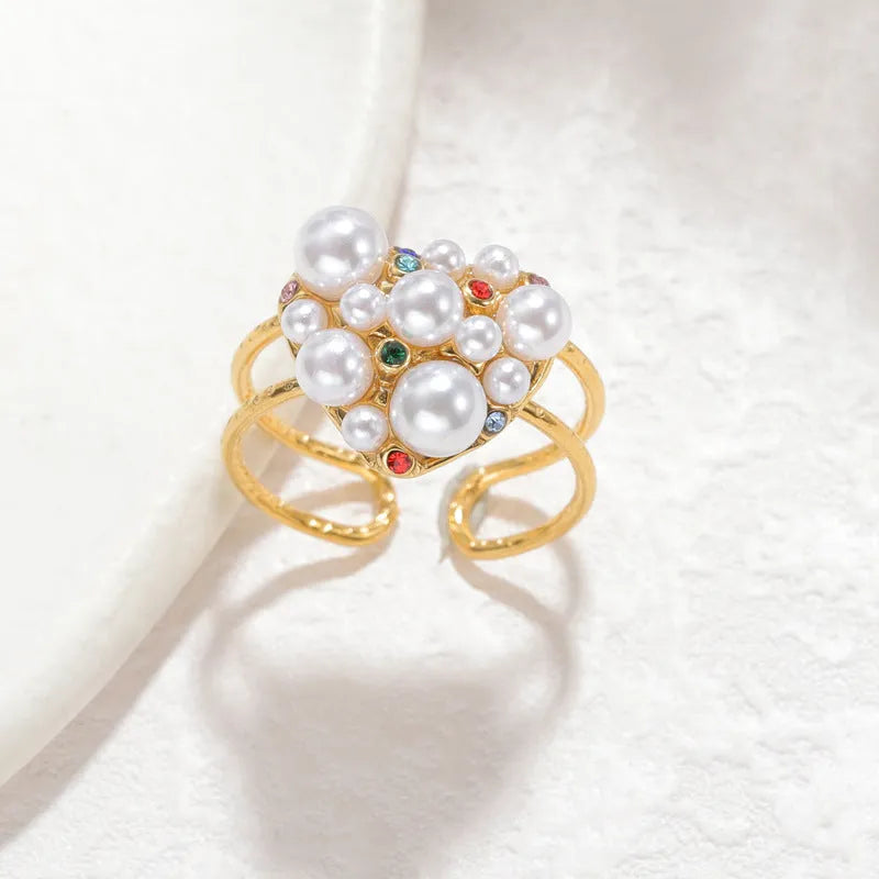 Women's adjustable open mouth ring with pearl and zircon decorative elements on stainless steel