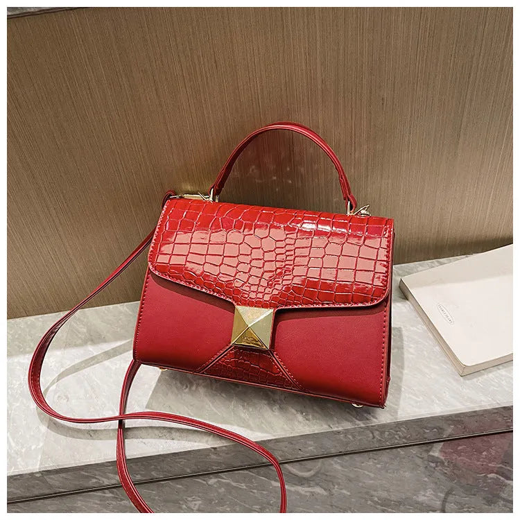 Mining stone pattern square pouch shoulder bag in black with stitching and shoulder strap