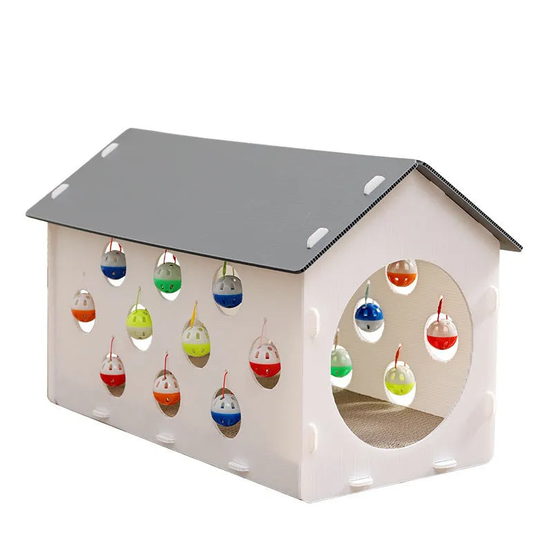 White plastic cat scratch board with integrated enclosed nest, tunnel, and hanging bell ball toy.