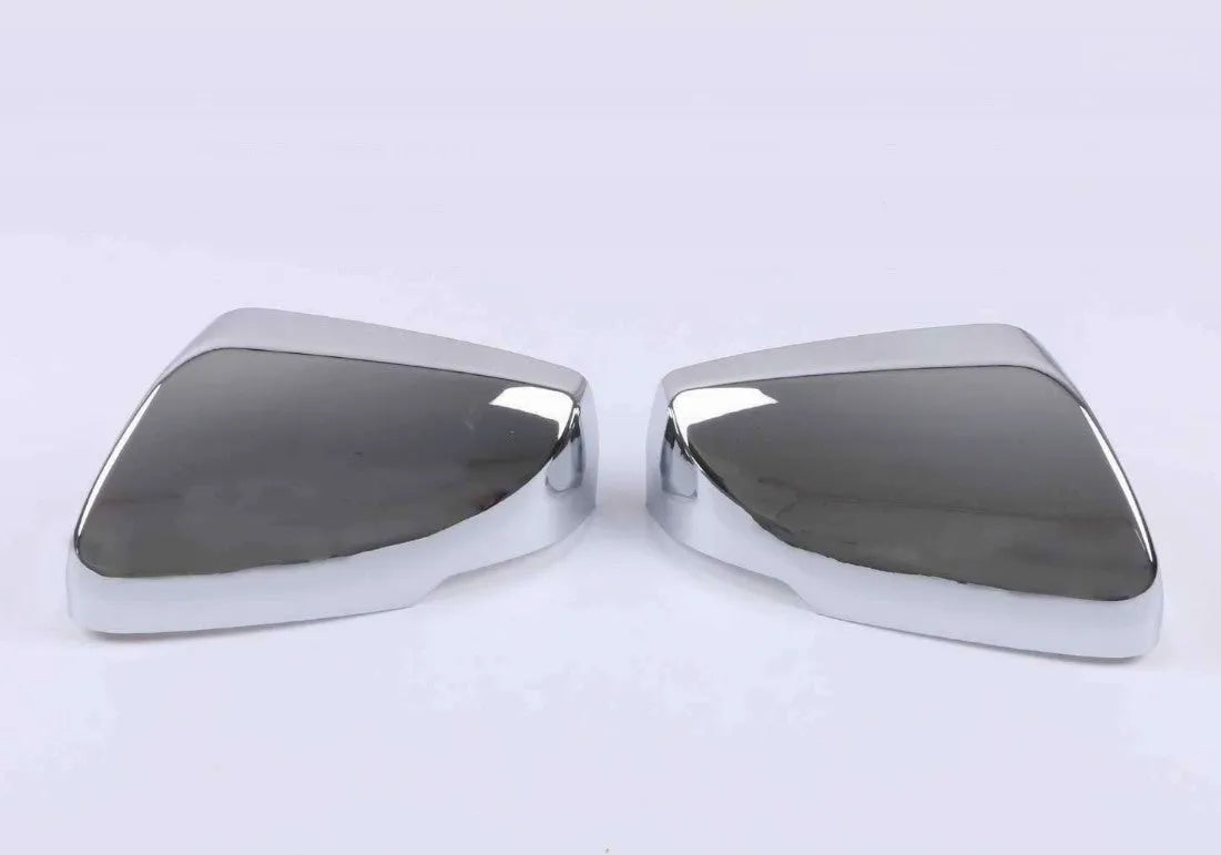 Set of ABS plastic mirror covers for Cadillac CT5 and CT6 in carbon fibre, silver, and rain frame finishes.