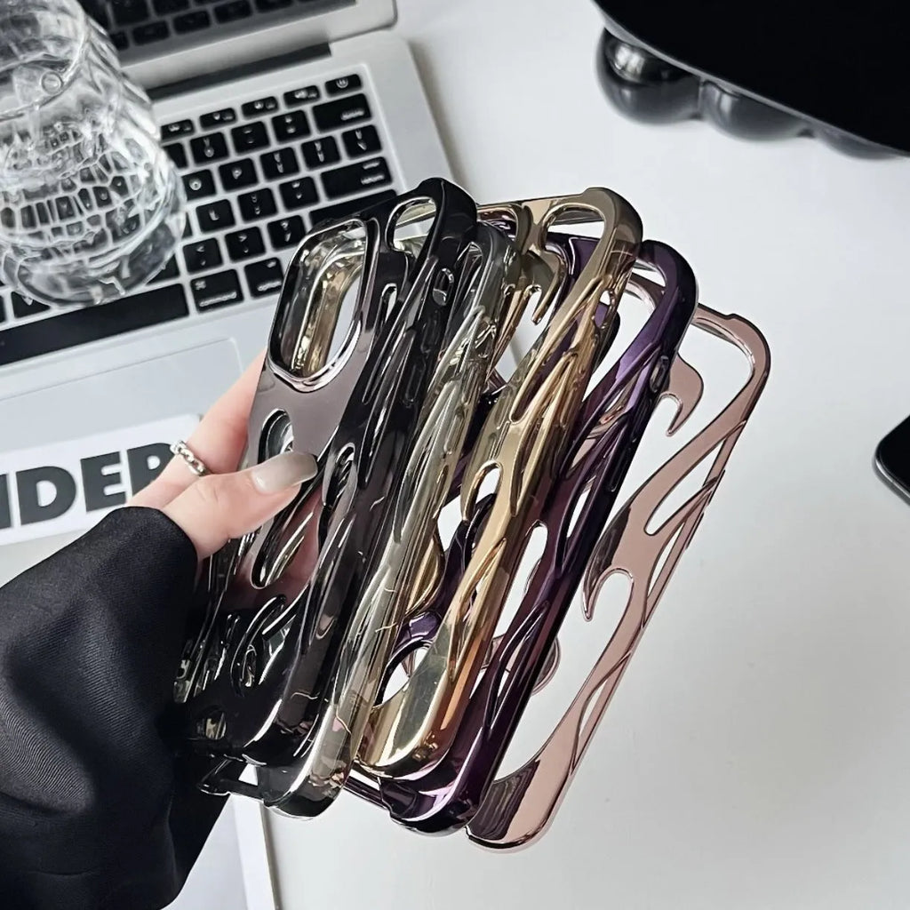 Electroplated hollow flame pattern mobile phone case for iPhone on a dark background, showing silver metallic finish.