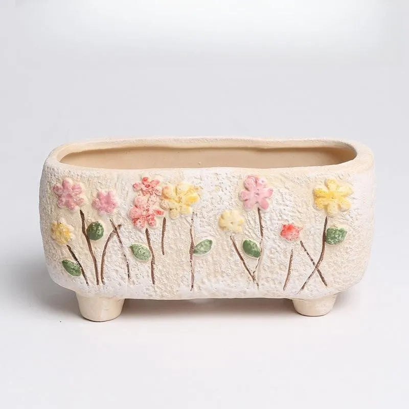 Hand-painted rectangular ceramic flower pot for succulents measuring 13.7cm long by 6.2cm wide
