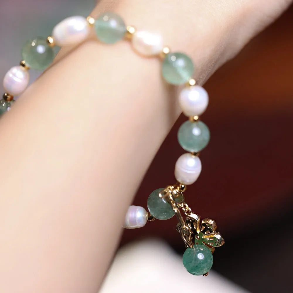 Handmade green strawberry freshwater pearl bracelet with peace buckle and hanging flower charm