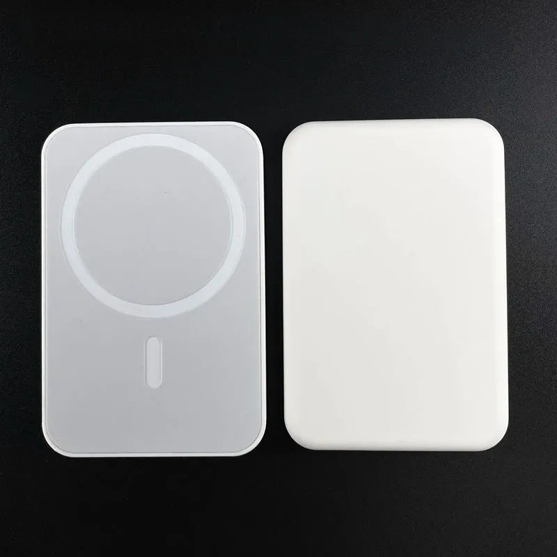 White magnetic wireless power bank showing compact 100x65x16mm dimensions with wireless charging surface