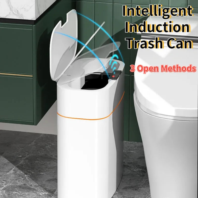 White smart induction trash can with automatic opening lid, shown in a kitchen setting.