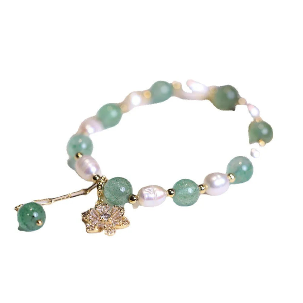 Handmade green strawberry freshwater pearl bracelet with peace buckle and hanging flower charm