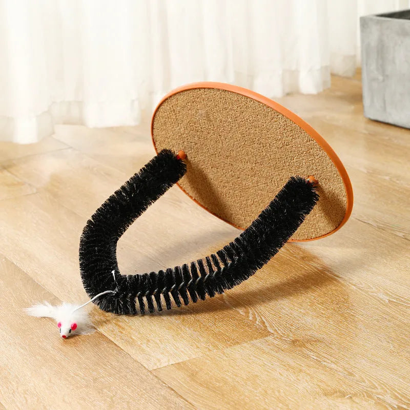 Black arch-shaped cat grooming brush with attached mouse toy on non-slip base