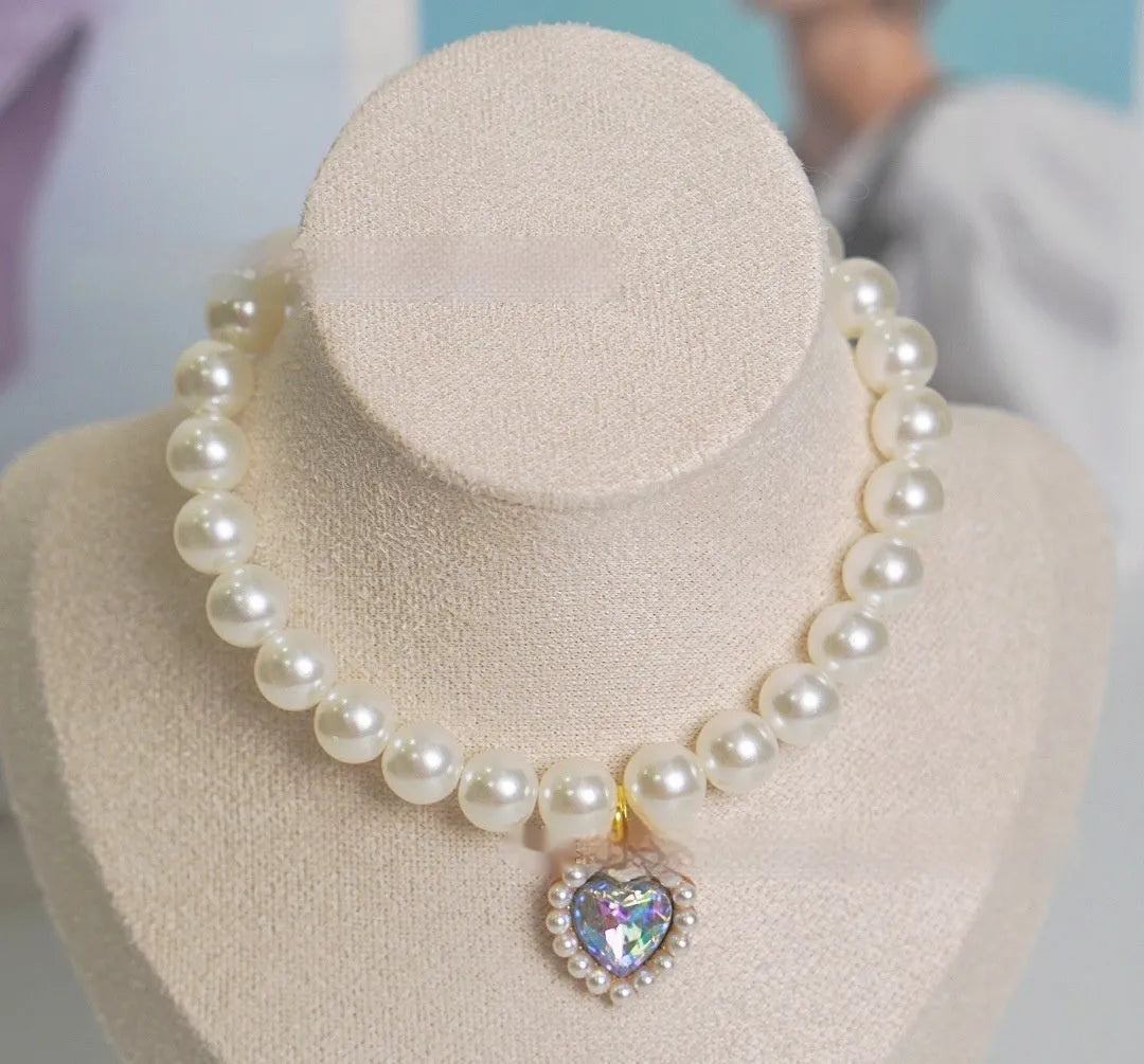 Decorative cat collar with plastic alloy resin construction and central gemstone charm in multiple colour options