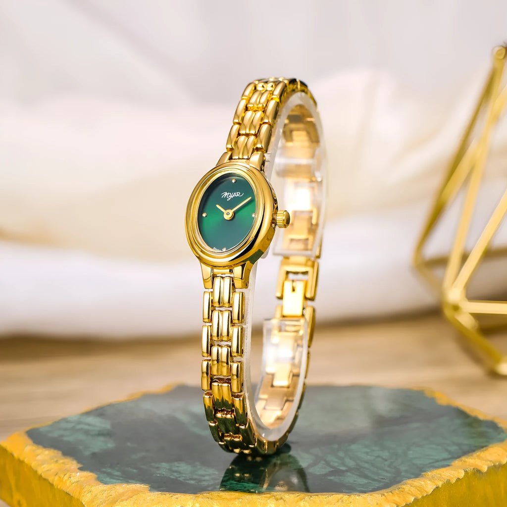 Oval mini women's vintage quartz watch with gold case, alloy strap, 30M water resistance, and 18mm x 22mm dial.
