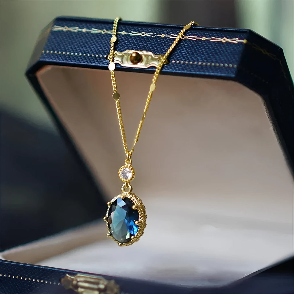 Geometric pendant necklace with a gold electroplated finish on a copper chain, French retro style.