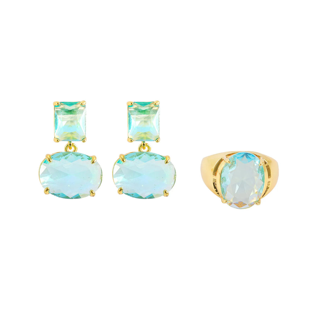 Pair of geometric earrings with gold plated copper base and golden blue glass pendant in ellipse shape on white background