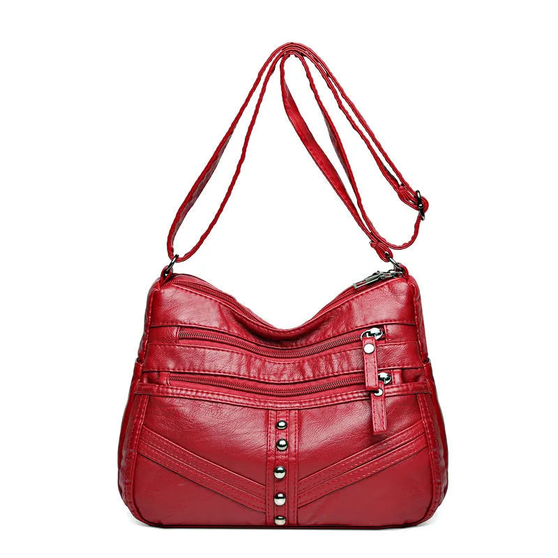 Ladies soft PU messenger bag in vintage style, available in black, brown, and red, horizontal square shape