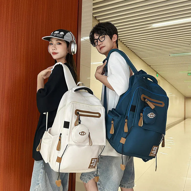 Large capacity waterproof nylon travel backpack with contrast stitching in beige colour option